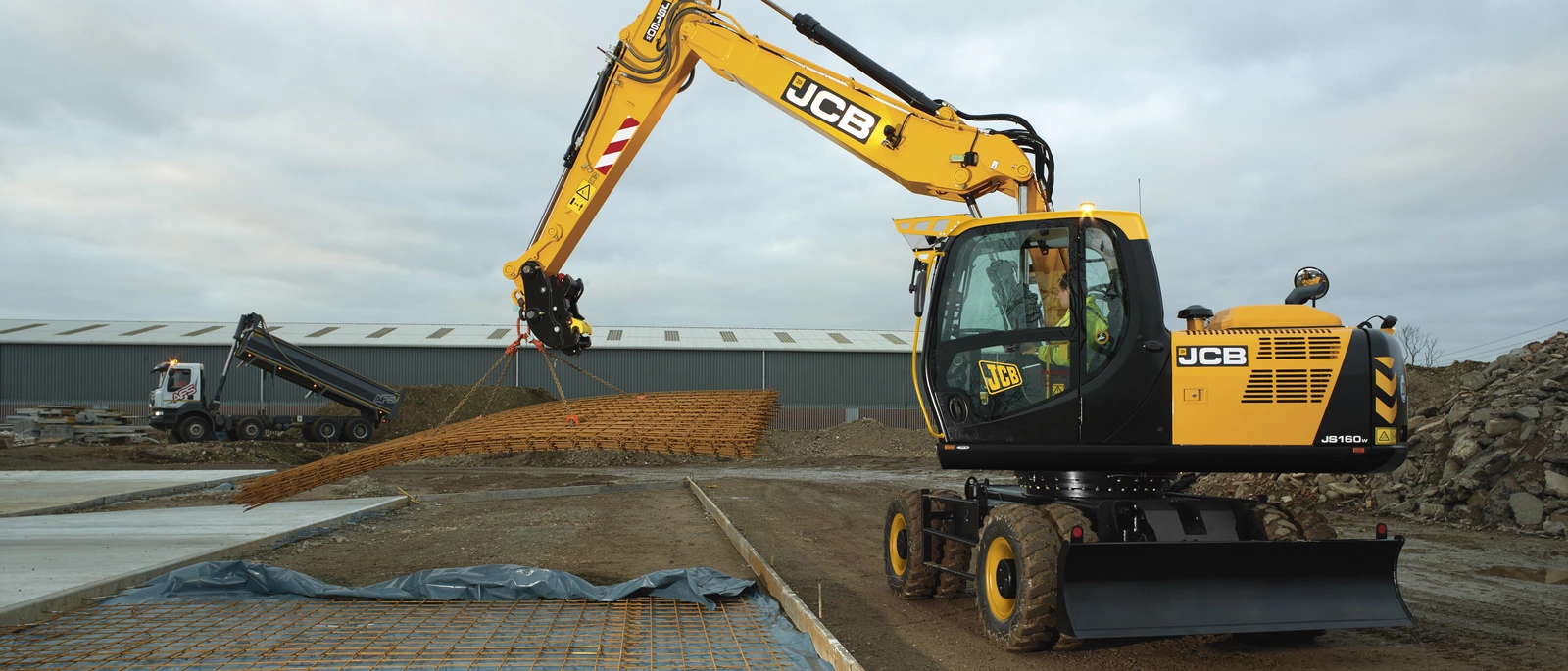 Колёсный экскаватор JCB С160